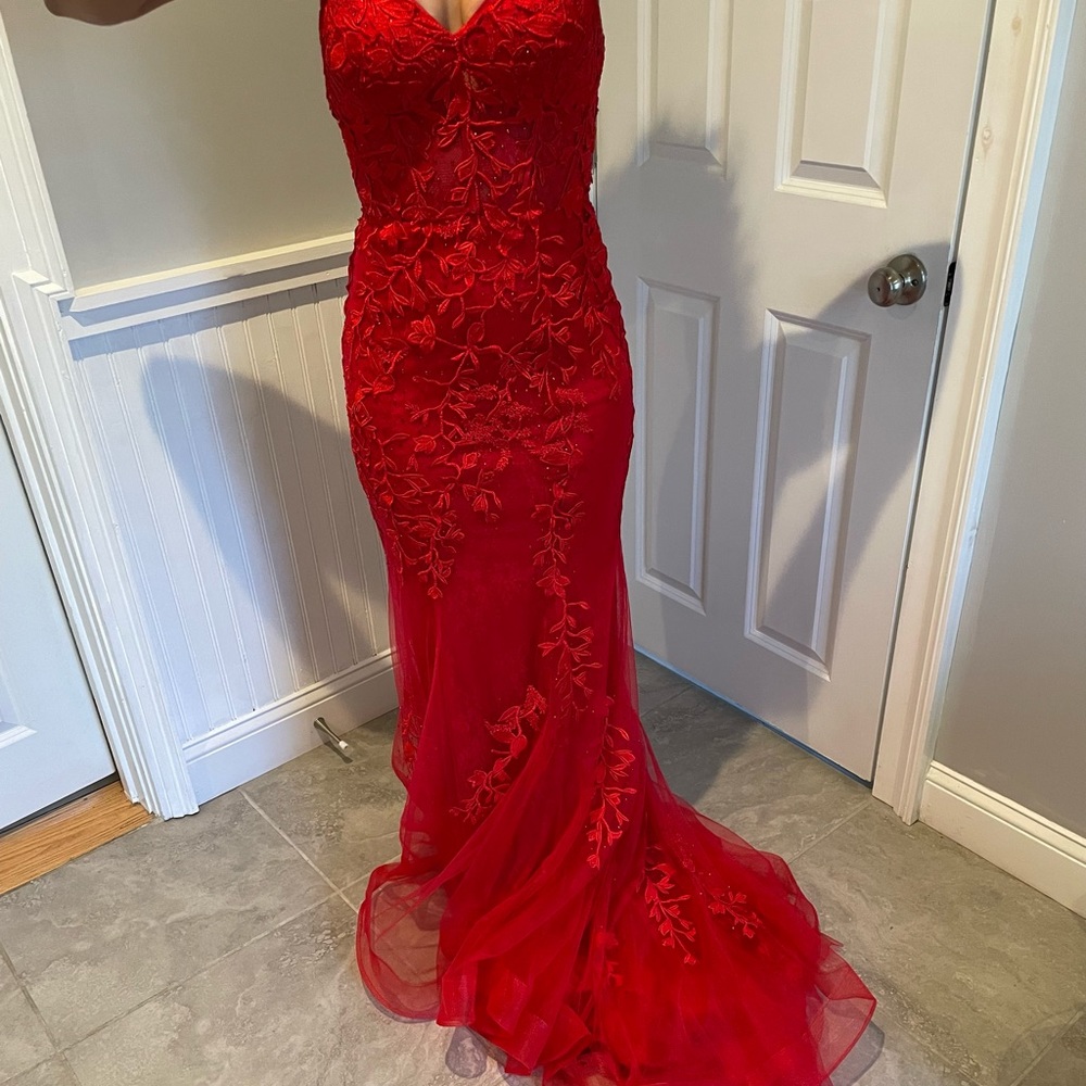 Selling my daughter’s last year’s prom dress. Red dress, only worn once.